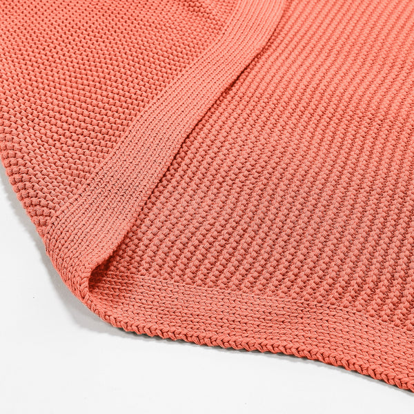 Sofa Pledd / Teppe - Ellos Grovstrikket Korall Fabric Close-up Image